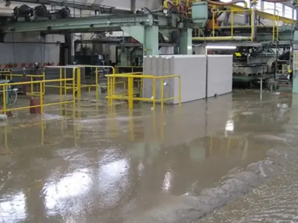 Water spread across a commercial floor in a Sandy, UT business